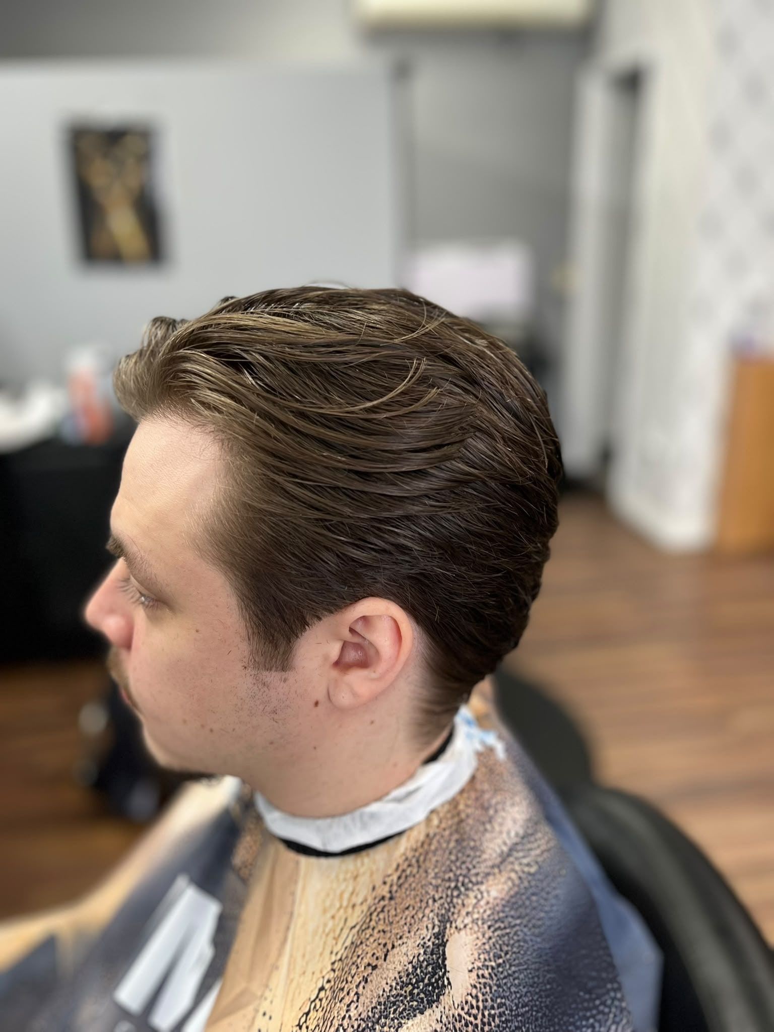Longer swept-back style with tapered sides