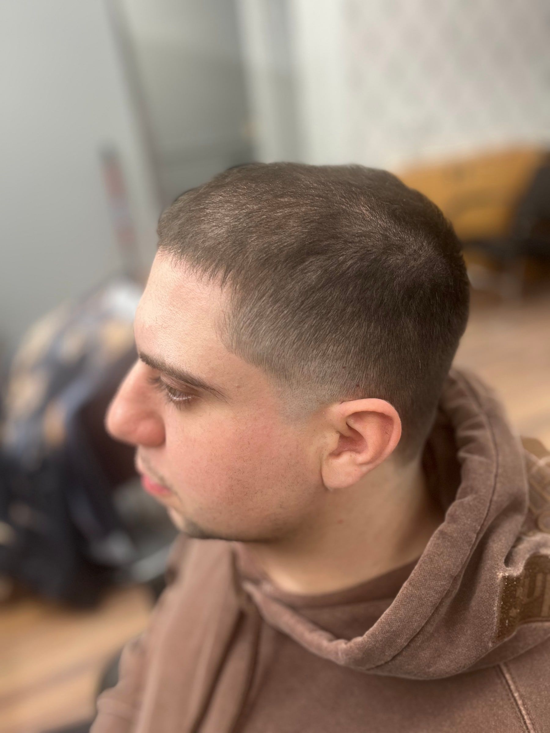 Short crop with a low fade and a natural hairline